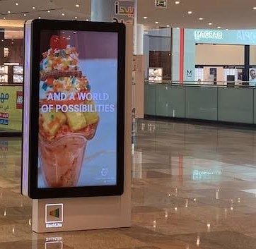 Digital advertising kiosk inside a shopping mall